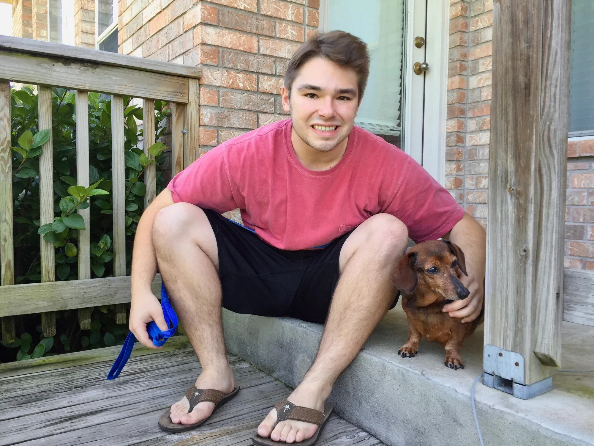 Austin with Blaze the dachshund — the mascot, the namesake